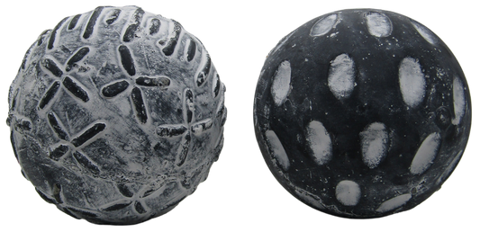 Two textured black and gray concrete garden spheres set decorative outdoor yard and patio accents