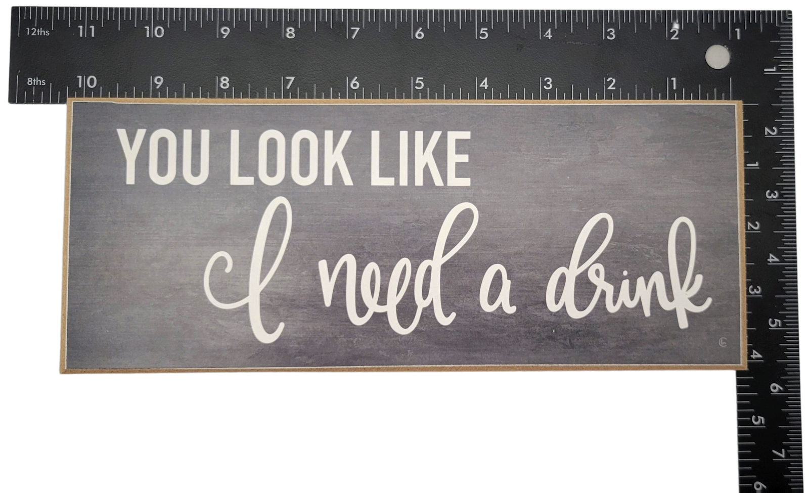You look like i need a drink sign with white text on gray wooden home decor by Jan Michaels Art & Home